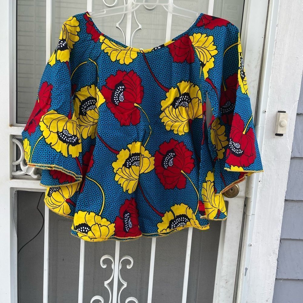 Beautiful African prints blouse,size large.100% cotton,you can wear with jeans